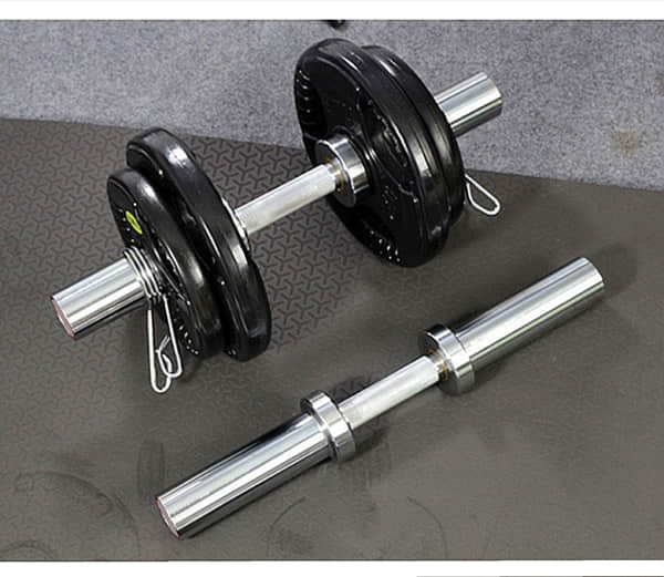 Image featuring a close-up of a dumbbell with added weights.