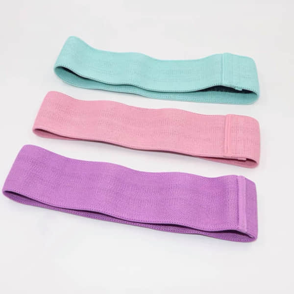 Close-up view of fabric resistance bands tailored for glute exercises.